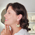 Brinco Grande Haste com Flor Maria Banho Ouro 18k - Trelori 
