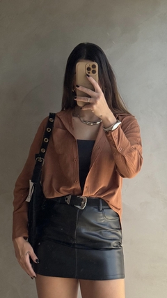 Saia Cléo couro P.U na internet