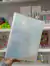 carpeta A4 con 20 folios-celeste gliter