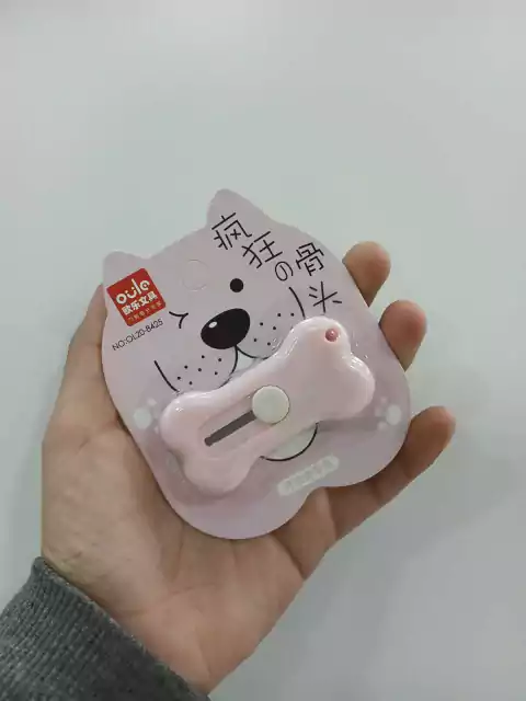 Mini cuter forma de huesito-rosa