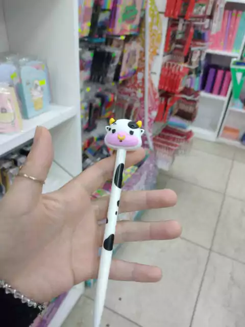 Lapicera retractil azul - Vaquita negro y blanco