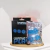Kit com 4 anéis penianos que brilham no escuro, embalagem da marca Lovetoy com destaque para o nome Lumino Play.