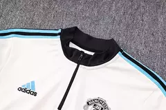 CONJUNTO TRAINING MANCHESTER UNITED 22/23 BRANCO/PRETO na internet