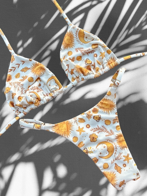 Bikini Cortininha com Calcinha Regulável Astros Dourados - comprar online