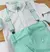 Conjunto Camisa Social ou Body Branca Inglaterra Verde Império Calça Verde Tiffany Esporte Fino Botão Branco Gravata Borboleta e Suspensório Verde Inglaterra Império Índigo Trend - comprar online
