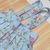 Saia de Pregas Jardineira Catherine Floral Infantil Bebê Índigo Trend - Índigo Trend