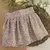 Conjunto Bata ou Body Branca Menina Saia de Pregas e Tiara Orelha Páscoa Poá Coelha Encanto Índigo Trend na internet