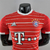 Camisa Bayern de Munique Casa 22/23- Versão Jogador Masculino - Adidas - Vermelha com Listras Angulares Brancas - PW Sports - Loja de Artigos Esportivos