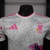 Camisa Japão Edição Especial Primavera 24/25- Versão Jogador Masculino - Adidas - Branca com detalhes em Rosa e Azul - PW Sports - Loja de Artigos Esportivos