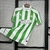 Camisa Real Betis Casa 24/25 - Versão Torcedor Masculino - Hummel - Branco com Listras Verdes - PW Sports - Loja de Artigos Esportivos