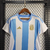 Camisa Argentina Casa 24/25 Patchs Opcionais - Versão Torcedora Feminina - Adidas - Azul e Branco - Listrada - PW Sports - Loja de Artigos Esportivos