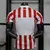Camisa Atlético de Madrid Home 2025/2026 - Versão Jogador Masculino - Nike - Vermelha e Branca Listrada - PW Sports - Loja de Artigos Esportivos