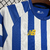 Imagem do Camisa Porto Pré Jogo 24/25 - Versão Torcedor Masculino - New Balance - Branco com Listras Azuis