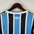 Camisa Grêmio Casa 23/24 - Versão Torcedora Feminina - Umbro - Azul com detalhes Listrados em Branco e Preto - loja online