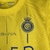 Kit Infantil Al Nassr Casa 23/24 - Versão Torcedor Unissex - Nike - Amarelo com detalhes em azul - loja online