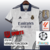 Camisa Real Madrid Edição Especial Dragão 23/24 - Versão Torcedor Masculino - Adidas - Branco