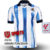 Camisa Real Sociedad Casa 23/24 - Versão Torcedor Masculino - Macron - Branco e Azul