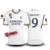 Camisa Real Madrid Casa 23/24 Patch 15 UCL + Mbappé #9 - Versão Torcedor Masculino - Adidas - Branco