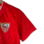 Kit Infantil Sevilla II Castore 23/24 - Vermelho com ondulações cinza e dourado