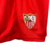 Kit Infantil Sevilla II Castore 23/24 - Vermelho com ondulações cinza e dourado - PW Sports - Loja de Artigos Esportivos