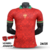 Camisa masculina da seleção de Portugal, edição especial CR7 "The Siu" 2024/25, vermelha com detalhes em verde e padrão decorativo.