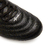 Detalle de los botines Joma Aguila Top FG para hombre, en color negro, con diseño texturizado y cordones.