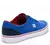 Zapatillas DC Trase SD para hombre en color azul con detalles rojos y suela blanca.