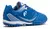 Botines Filament Star Turf Junior en color azul, diseñados para fútbol infantil, con suela adecuada para césped sintético.