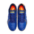 Botines Joma Dribling para hombre en color azul con detalles en naranja, vista superior.
