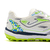 Botines Joma Liga 5 para hombre, con diseño en blanco y detalles en verde y azul, ideales para fútbol 5.