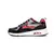 Zapatillas Skechers Uno Gen1 de color negro, gris y rojo, diseñadas para niños, con suela blanca y detalles en el costado.