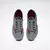 Zapatillas Reebok Speed 22 TR para hombre en color gris con detalles rojos, vistas desde arriba.