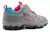 Zapatillas Filament Dealton Junior en color gris con detalles en rosa y azul, diseñadas para actividades al aire libre.