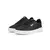 Zapatillas Puma Carina para mujer, color negro con suela blanca y diseño urbano.