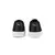 Zapatillas Puma Carina para mujer, vista trasera en color negro con suela blanca.