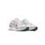 Zapatillas Reebok GL1100 para mujer en tonos grises con detalles en rojo y azul.