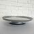 Pie Bandeja Plastica con Pie Plateada x 26 cm.