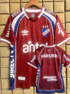 CAMISETA TITULAR NACIONAL BROWN 26/27