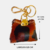 Chaveiro com Design Bolsa de Couro na internet