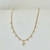 Colar Choker Tubinhos Lisos com Zirconias Penduradas no Dourado