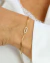 Pulseira com Círculos Alongados Liso e Cravejado no Dourado - comprar online