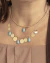 Colar Elos Cartier com Chapas Lisas e Gotas de Cristais Azul no Dourado na internet