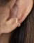 Brinco Piercing Unitario Fake Ondulado de Microzirconias no Dourado - comprar online