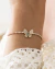 Pulseira Riviera Ajustavel Borboleta de Microzirconias com Navete Turmalina no Dourado - comprar online