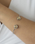 Pulseira Bracelete com Circulos na Ponta no Ródio Branco com Dourado - comprar online