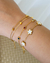 Pulseira Elos com Cristais Coloridos no Aço Dourado na internet