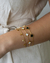 Pulseira Elos com Folhinhas Lisas no Aço Dourado na internet