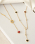 Colar Gravatinha Elos com Corações de Resina no Aço Dourado na internet