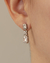 Brinco Ear Cuff Zirconias Retangular e Flor no Ródio Branco - comprar online