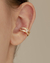 Brinco Piercing Unitario Tiras de Microzirconias e Baguete de Zirconia no Dourado - comprar online